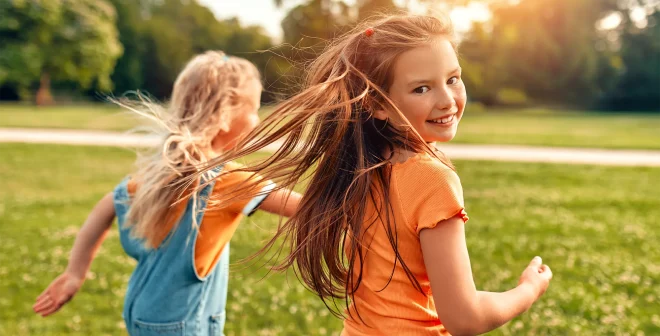 Happy family relaxing in the park